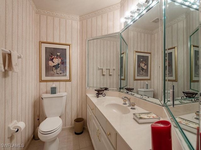 8440 Abbington Cir Unit D16, Naples, FL 34108 - half bathroom featuring toilet, wallpapered walls, tile patterned floors, and vanity