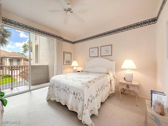 8440 Abbington Cir Unit D16, Naples, FL 34108 - carpeted bedroom featuring access to exterior, ceiling fan, and baseboards