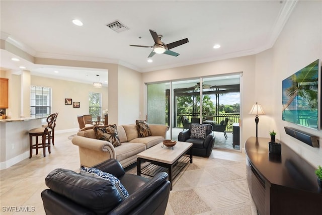 9022 Cascada Way Unit 201, Naples, FL 34114 - living room featuring plenty of natural light, light tile patterned floors, crown molding, recessed lighting, and a ceiling fan