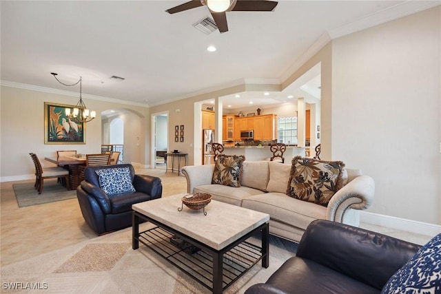 9022 Cascada Way Unit 201, Naples, FL 34114 - living room with crown molding, arched walkways, ceiling fan, baseboards, and recessed lighting