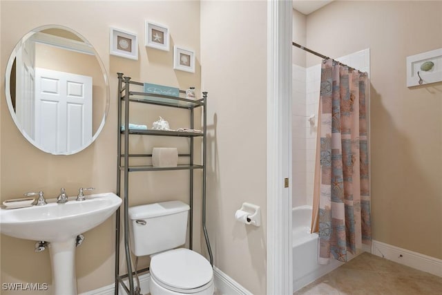 9022 Cascada Way Unit 201, Naples, FL 34114 - full bath with toilet, shower / bathtub combination with curtain, tile patterned floors, and baseboards