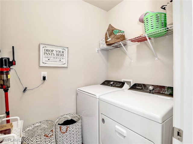 1036 Alaska Ave, Lehigh Acres, FL 33971 - laundry area with washer and clothes dryer