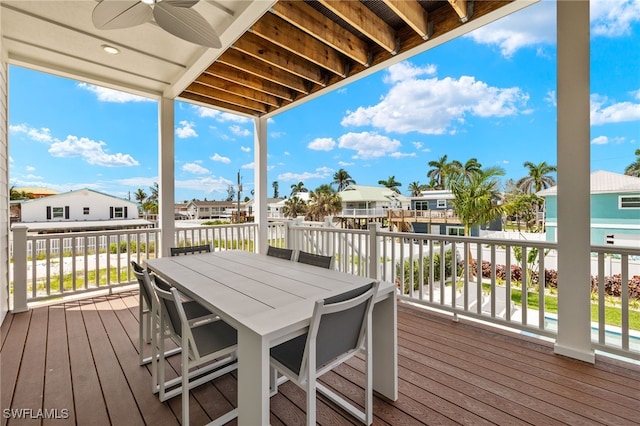 5583 Estero Blvd, Fort Myers Beach, FL 33931 - deck featuring a ceiling fan, a residential view, and outdoor dining area