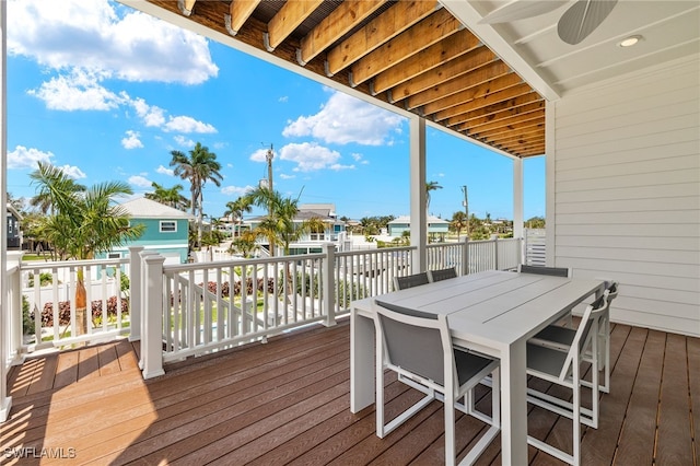5583 Estero Blvd, Fort Myers Beach, FL 33931 - wooden terrace with outdoor dining area
