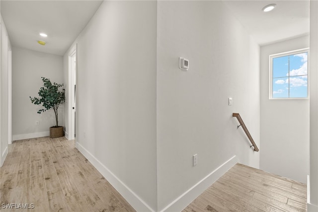 5583 Estero Blvd, Fort Myers Beach, FL 33931 - hallway with an upstairs landing, light wood-style flooring, and recessed lighting