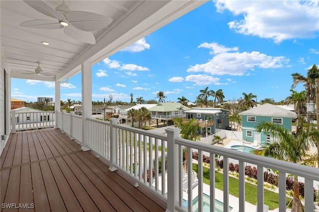 5583 Estero Blvd, Fort Myers Beach, FL 33931 - balcony featuring a residential view and ceiling fan