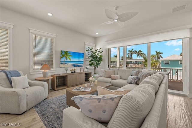 5583 Estero Blvd, Fort Myers Beach, FL 33931 - living room featuring a ceiling fan, light wood finished floors, and recessed lighting