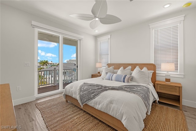 5583 Estero Blvd, Fort Myers Beach, FL 33931 - bedroom with access to exterior, light wood finished floors, recessed lighting, and ceiling fan