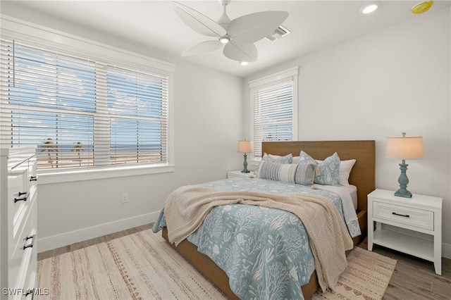 5583 Estero Blvd, Fort Myers Beach, FL 33931 - bedroom with light wood-style floors, recessed lighting, and ceiling fan