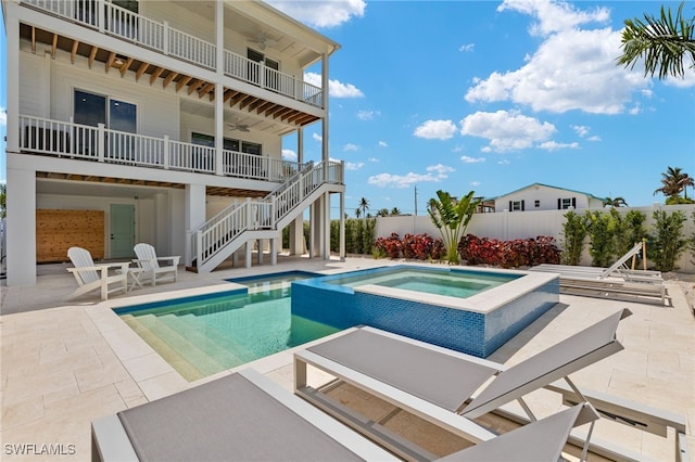 5583 Estero Blvd, Fort Myers Beach, FL 33931 - view of swimming pool with ceiling fan, stairs, a patio, and a pool with connected hot tub