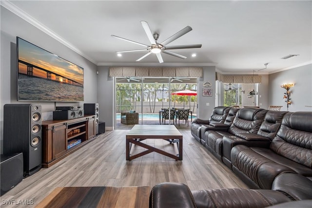 3628 NW 3rd Ter, Cape Coral, FL 33993 - living room with a ceiling fan, crown molding, light wood finished floors, and recessed lighting