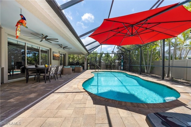 3628 NW 3rd Ter, Cape Coral, FL 33993 - view of swimming pool featuring a patio, glass enclosure, a ceiling fan, and outdoor lounge area