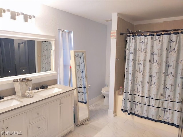 306 Pendleton Ave, Lehigh Acres, FL 33974 - full bath with toilet, marble look tiles, double vanity, and a shower with shower curtain