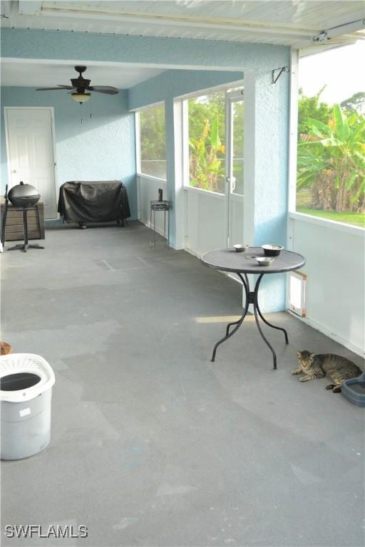 306 Pendleton Ave, Lehigh Acres, FL 33974 - sunroom with a ceiling fan and plenty of natural light