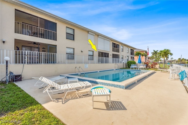 4538 SE 5th Pl Unit 3, Cape Coral, FL 33904 - community pool with a patio area and a ceiling fan
