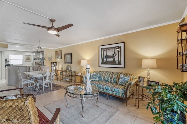 4538 SE 5th Pl Unit 3, Cape Coral, FL 33904 - living area with tile patterned floors, crown molding, and ceiling fan