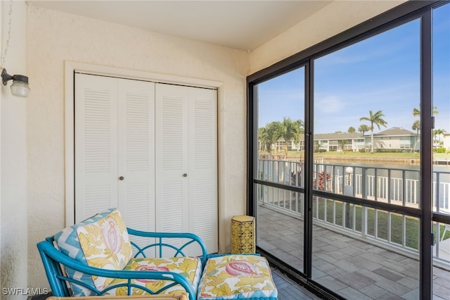 4538 SE 5th Pl Unit 3, Cape Coral, FL 33904 - sunroom / solarium with a water view