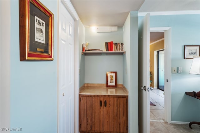 4538 SE 5th Pl Unit 3, Cape Coral, FL 33904 - hall with light tile patterned floors and a wall mounted AC