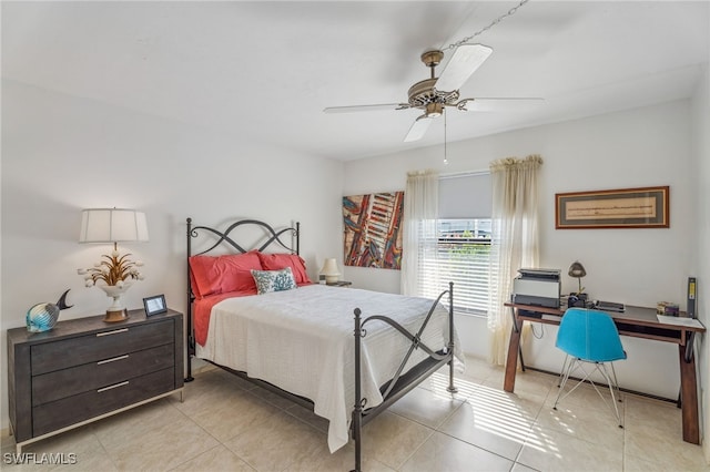 4538 SE 5th Pl Unit 3, Cape Coral, FL 33904 - bedroom with an office area, light tile patterned floors, and ceiling fan