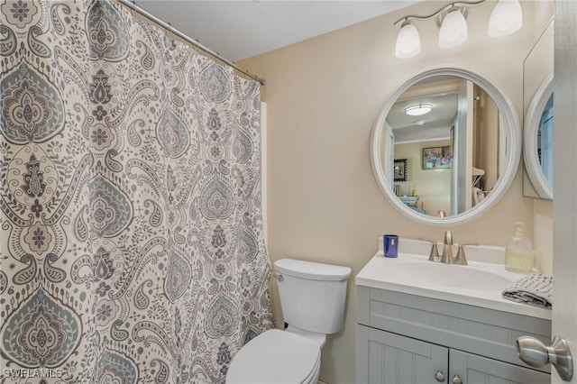 4538 SE 5th Pl Unit 3, Cape Coral, FL 33904 - full bathroom with vanity, toilet, and curtained shower