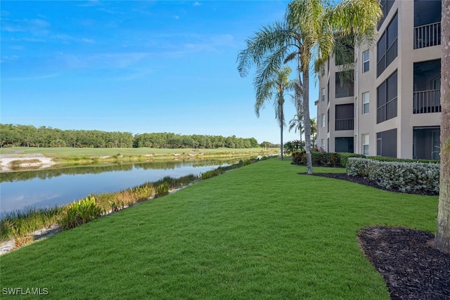 10275 Heritage Bay Blvd Unit 737, Naples, FL 34120 - view of green lawn with a water view