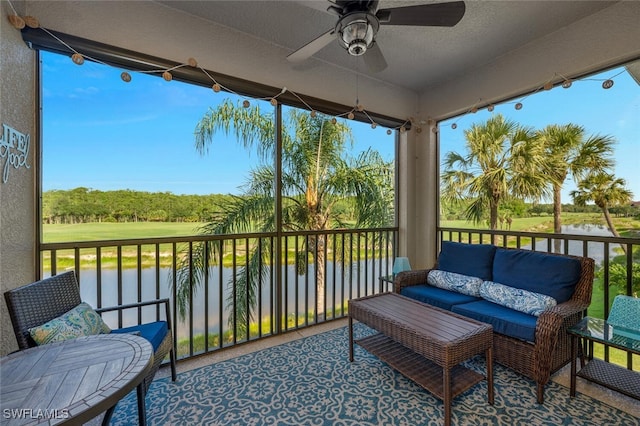 10275 Heritage Bay Blvd Unit 737, Naples, FL 34120 - sunroom / solarium featuring a water view, a ceiling fan, an outdoor living space, and view of wooded area