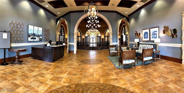 10275 Heritage Bay Blvd Unit 737, Naples, FL 34120 - reception area with a chandelier, crown molding, and a towering ceiling