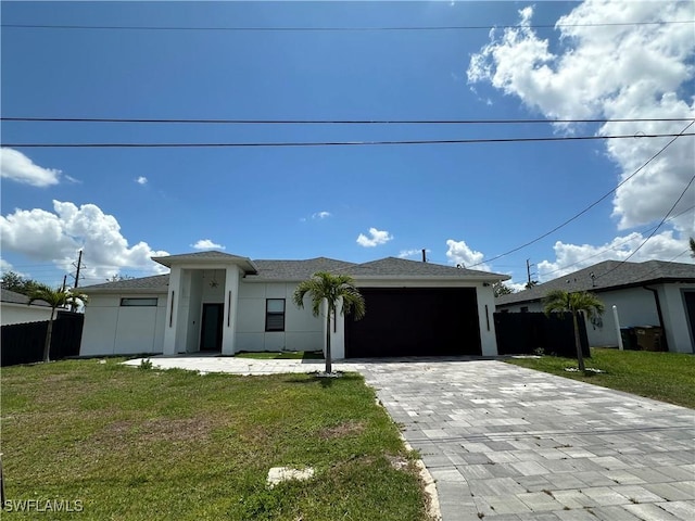 363 SW 24th Ct, Cape Coral, FL 33991 - single story home with a garage, decorative driveway, and stucco siding