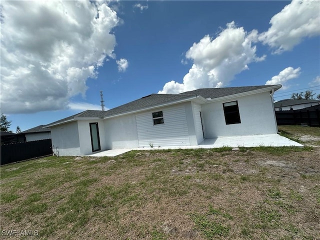 363 SW 24th Ct, Cape Coral, FL 33991 - rear view of property featuring stucco siding and a patio