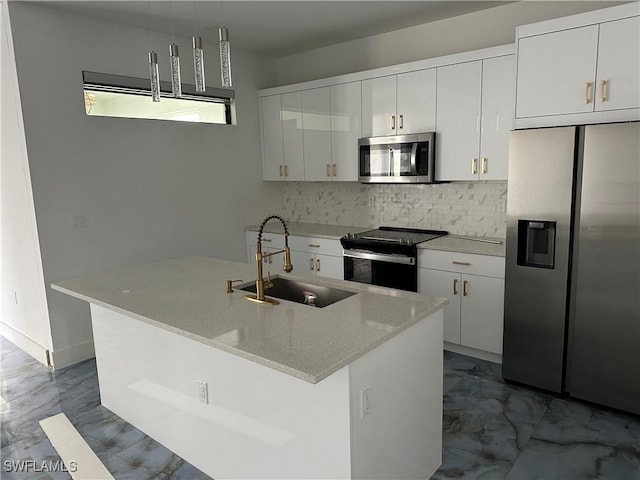 363 SW 24th Ct, Cape Coral, FL 33991 - kitchen featuring stainless steel appliances, a sink, and white cabinets