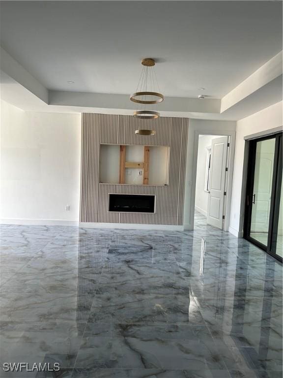 363 SW 24th Ct, Cape Coral, FL 33991 - unfurnished living room with marble tiled floors and baseboards