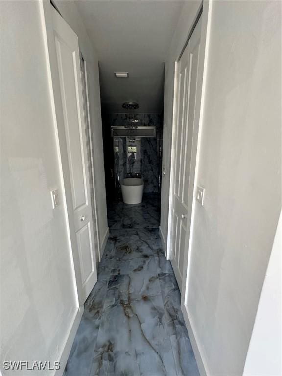 363 SW 24th Ct, Cape Coral, FL 33991 - corridor featuring marble finish floors