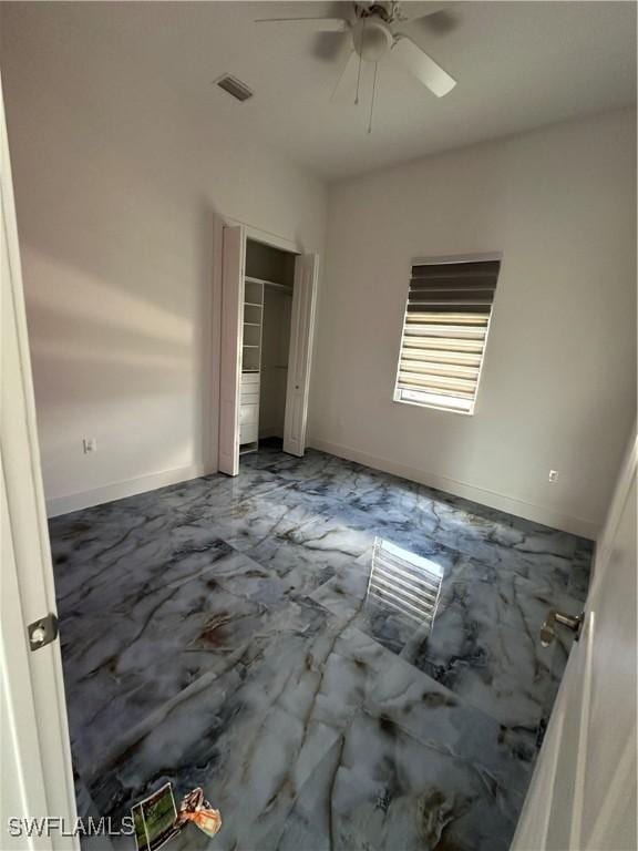 363 SW 24th Ct, Cape Coral, FL 33991 - unfurnished bedroom featuring a closet, baseboards, and a ceiling fan