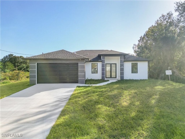 3313 66th St W, Lehigh Acres, FL 33971 - prairie-style home featuring an attached garage, a front yard, concrete driveway, and stucco siding