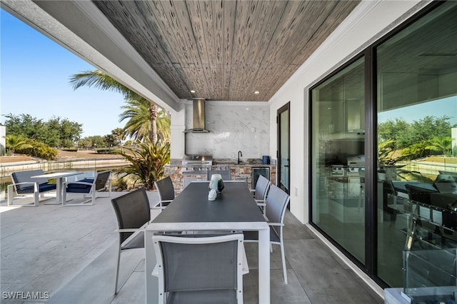 2405 SW 11th Ave, Cape Coral, FL 33991 - view of patio / terrace with outdoor dining space and a sink