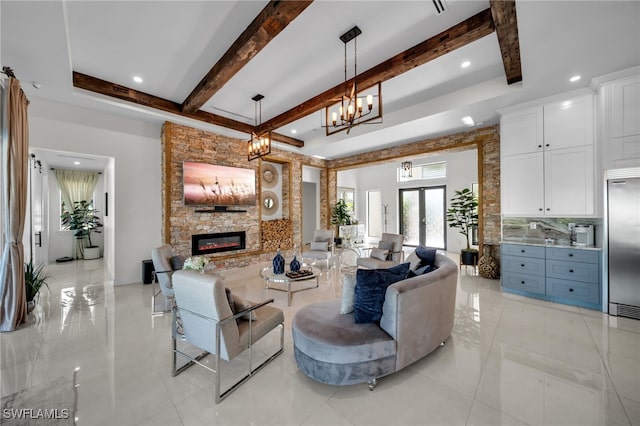 2405 SW 11th Ave, Cape Coral, FL 33991 - living room with a chandelier, beamed ceiling, a stone fireplace, light tile patterned flooring, and recessed lighting