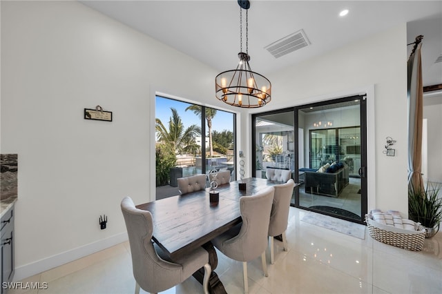 2405 SW 11th Ave, Cape Coral, FL 33991 - dining area with a chandelier, baseboards, and recessed lighting
