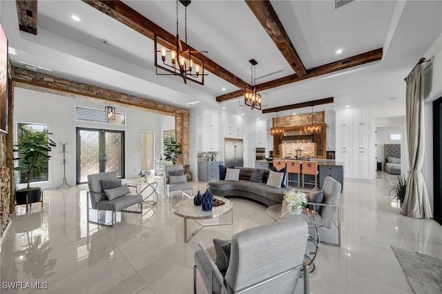 2405 SW 11th Ave, Cape Coral, FL 33991 - living area with a chandelier, beamed ceiling, light tile patterned flooring, and recessed lighting