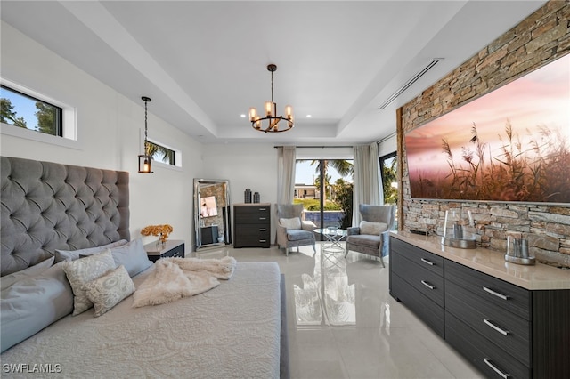 2405 SW 11th Ave, Cape Coral, FL 33991 - bedroom with access to outside, light tile patterned floors, a chandelier, and a tray ceiling
