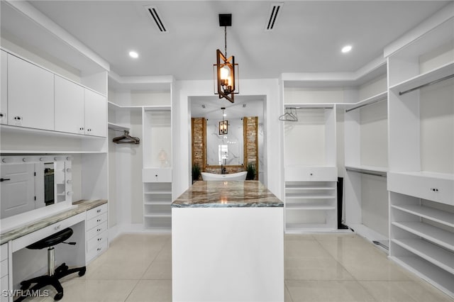 2405 SW 11th Ave, Cape Coral, FL 33991 - spacious closet with light tile patterned flooring