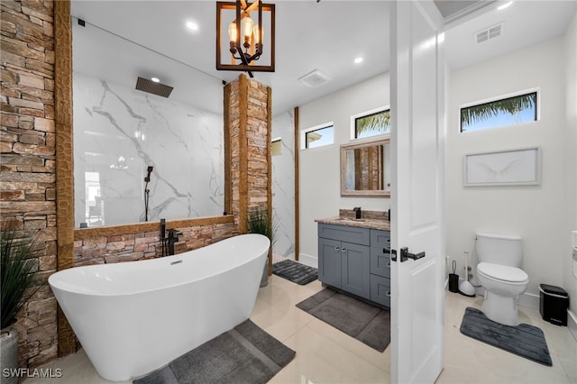 2405 SW 11th Ave, Cape Coral, FL 33991 - full bath with a freestanding bath, vanity, a marble finish shower, toilet, and recessed lighting
