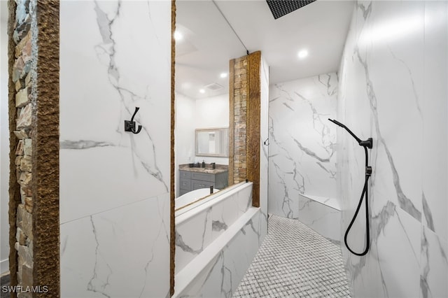 2405 SW 11th Ave, Cape Coral, FL 33991 - bathroom with a marble finish shower, vanity, recessed lighting, and stone wall