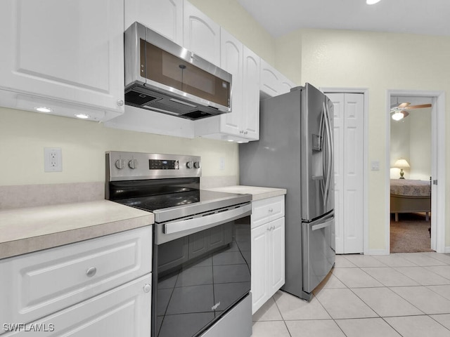2040 Embarcadero Way N, Fort Myers, FL 33917 - kitchen featuring appliances with stainless steel finishes, white cabinetry, light countertops, and light tile patterned floors