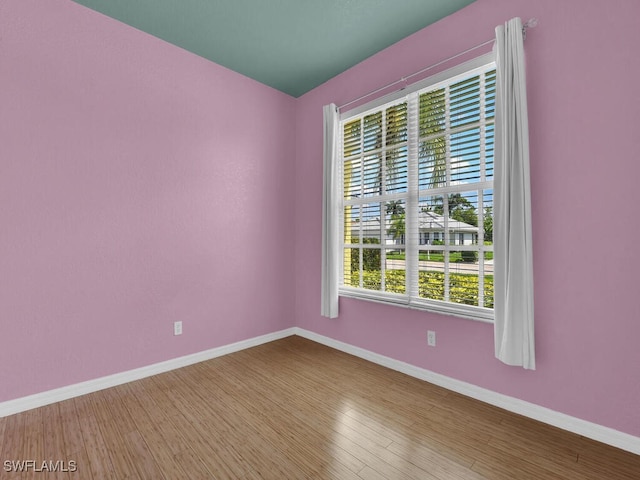 2040 Embarcadero Way N, Fort Myers, FL 33917 - spare room featuring baseboards and wood finished floors