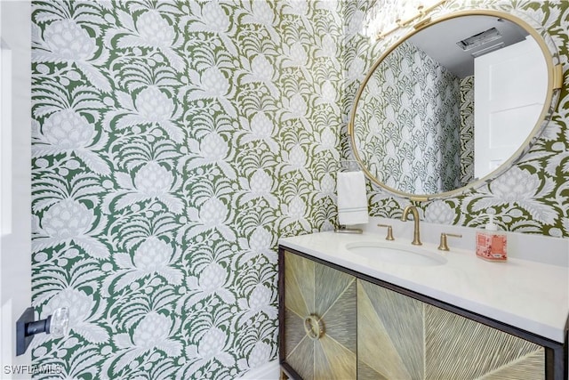 4701 Oak Leaf Dr, Naples, FL 34119 - bathroom featuring wallpapered walls and vanity