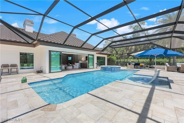 4701 Oak Leaf Dr, Naples, FL 34119 - view of swimming pool featuring a patio, a pool with connected hot tub, and a lanai