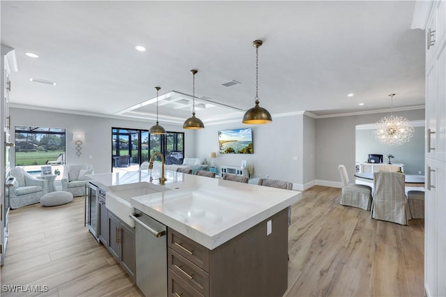 4701 Oak Leaf Dr, Naples, FL 34119 - kitchen with open floor plan, dishwasher, a sink, light countertops, and recessed lighting