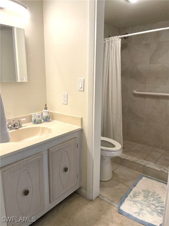 325 Charlemagne Blvd Unit B207, Naples, FL 34112 - full bath with vanity, toilet, and tiled shower