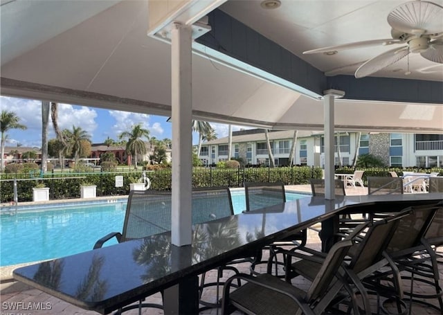 325 Charlemagne Blvd Unit B207, Naples, FL 34112 - community pool featuring a ceiling fan