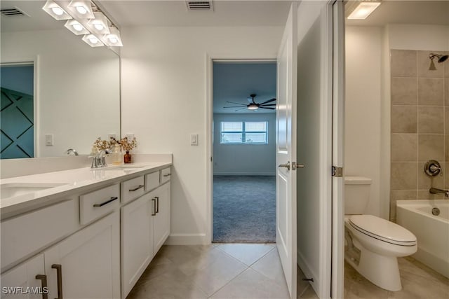 11260 Canopy Loop, Fort Myers, FL 33913 - full bath featuring double vanity, ceiling fan, tile patterned flooring, tub / shower combination, and toilet